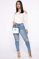 The Comeback Distressed Skinny Jeans - Light Blue Wash