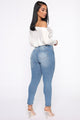 The Comeback Distressed Skinny Jeans - Light Blue Wash